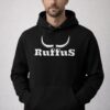 A man wearing a Ruffus Branded Hoodie. Solid chenter chest print.